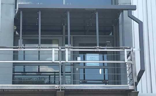 Fire exit canopy and gutter systems for offices in London
