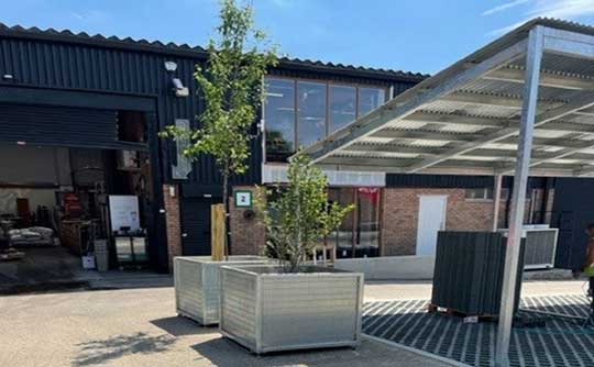 Galvanised street furniture and canopy for industrial area redevelopment in South London